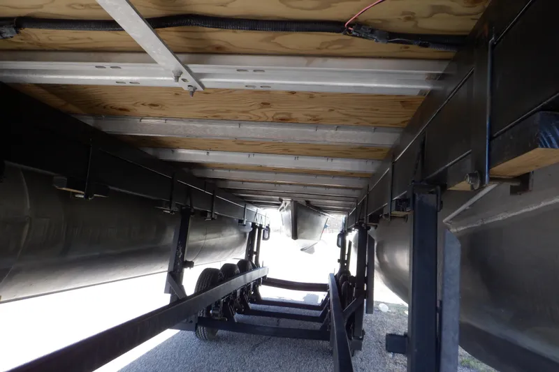 Slide: The Image of Underneath view of 2021 Sylvan Mirage 820 LZ pontoon boat on trailer. - 38