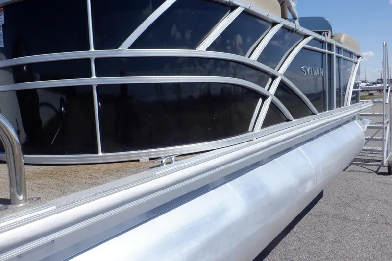 Slide: The Image of 2021 Sylvan Mirage 820 LZ pontoon boat with sleek black and silver design. - 40