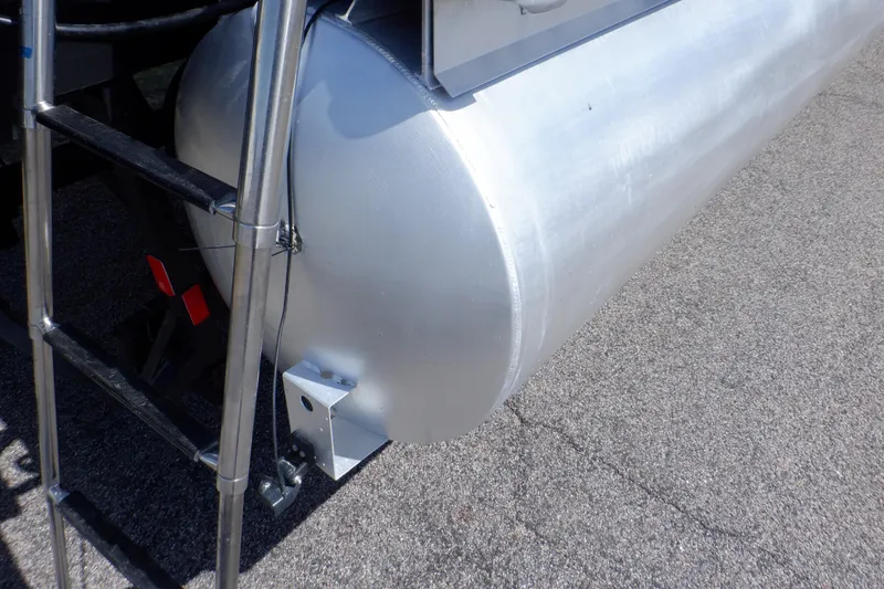 Slide: The Image of 2021 Sylvan Mirage 820 LZ pontoon detail with ladder on asphalt surface. - 41