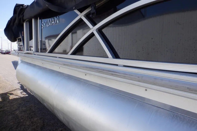 Slide: The Image of 2021 Sylvan Mirage 820 LZ pontoon boat, side view with sleek aluminum finish. - 43