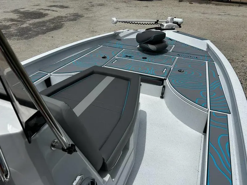 Slide: The Image of 2025 Xpress X23B Lounge boat interior with sleek seating and modern design. - 14