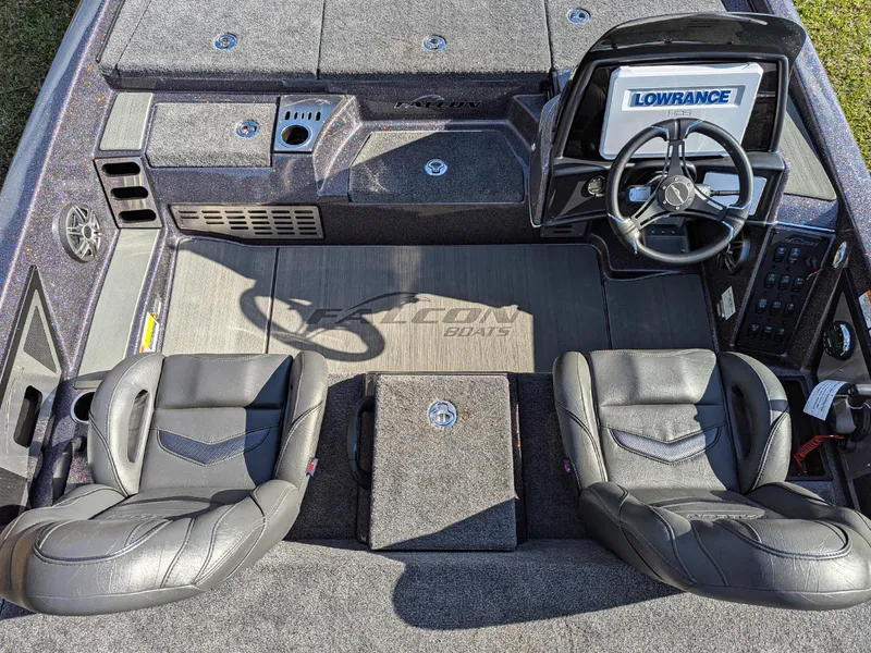 Slide: The Image of 2025 Falcon F20 PREDATOR boat interior with dual seats and Lowrance navigation system. - 13