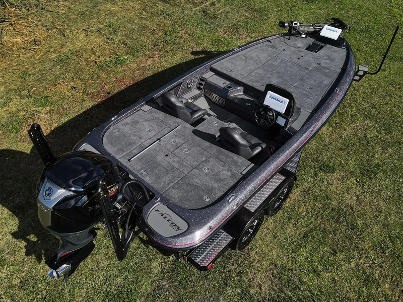 Slide: The Image of 2025 Falcon F20 PREDATOR boat on grass, showcasing sleek design and advanced features. - 18