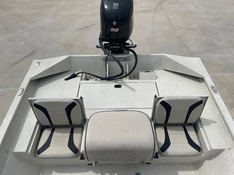 Slide: The Image of 2017 Alumacraft 1860 BAY CC TUNNEL boat with dual seats and outboard motor. - 12