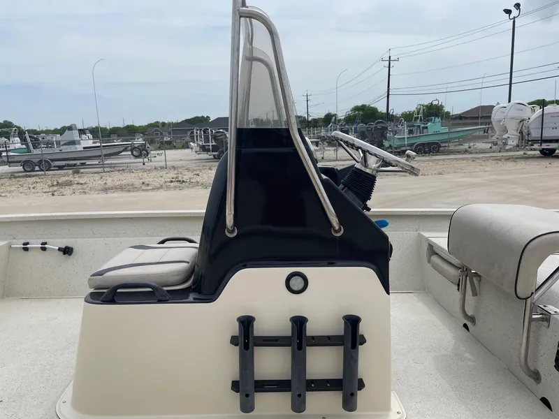 Slide: The Image of 2017 Alumacraft 1860 BAY CC TUNNEL boat interior with steering console and seating. - 21