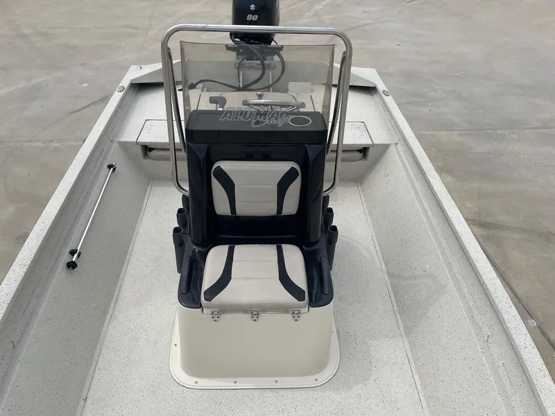 Slide: The Image of 2017 Alumacraft 1860 BAY CC TUNNEL boat interior with console and seating. - 22