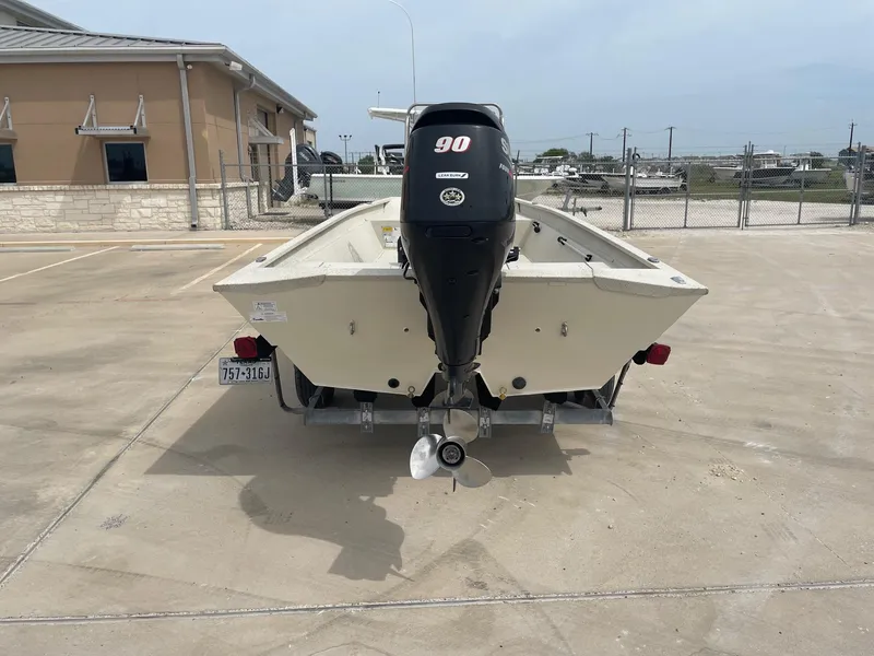 Slide: The Image of 2017 Alumacraft 1860 BAY CC TUNNEL boat with outboard motor on trailer. - 8