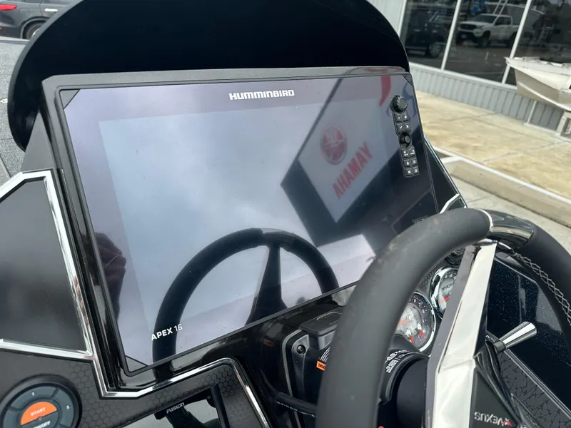 Slide: The Image of 2025 Vexus VXS21 boat dashboard with Humminbird Apex 16 display and steering wheel. - 15