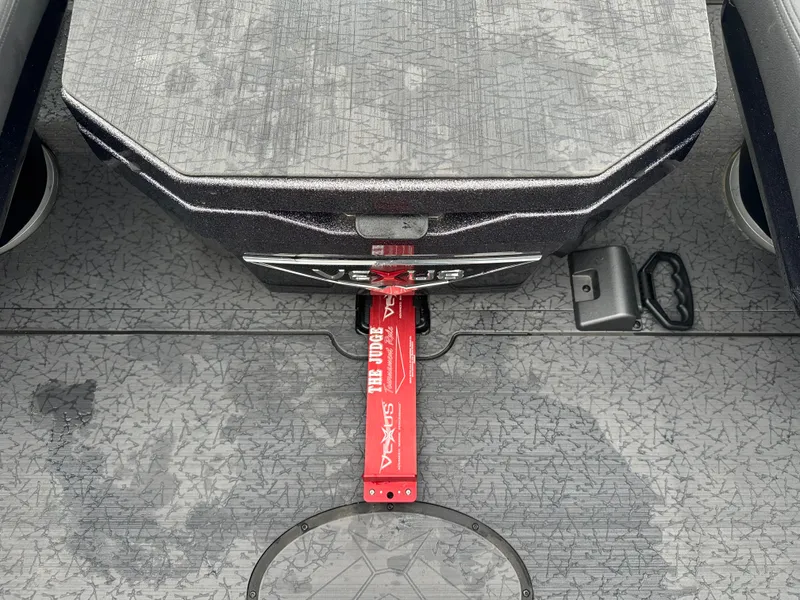 Slide: The Image of 2025 Vexus VXS21 boat interior with textured flooring and storage compartment. - 24