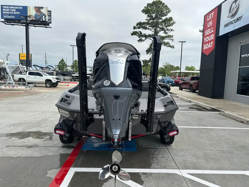 Slide: The Image of 2025 Vexus VXS21 boat displayed at a dealership with Mercury signage. - 30