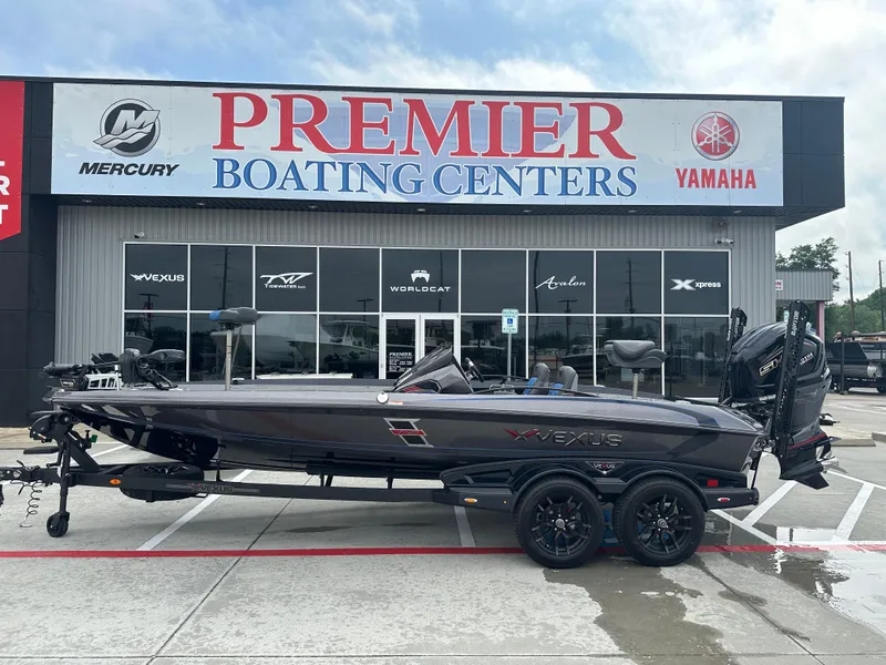 Slide: The Image of 2025 Vexus VXS21 boat displayed at Premier Boating Centers dealership. - 32