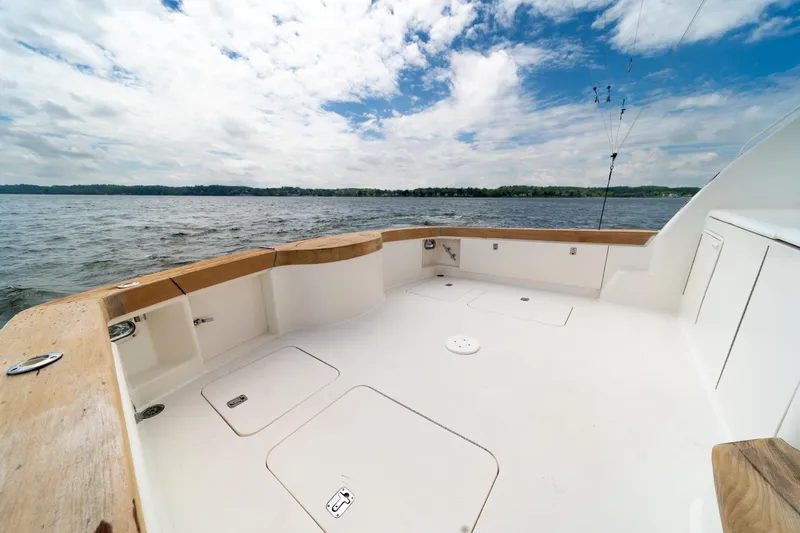 Slide: The Image of 2004 Ocean Yachts 50 Super Sport deck with ocean view and clear sky. - 11