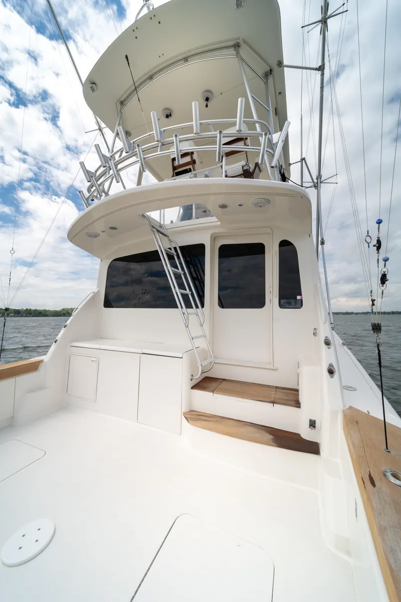 Slide: The Image of 2004 Ocean Yachts 50 Super Sport boat with spacious deck and flybridge. - 14