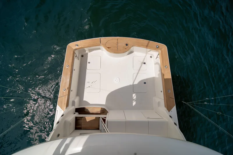 Slide: The Image of 2004 Ocean Yachts 50 Super Sport boat deck, viewed from above, surrounded by water. - 22