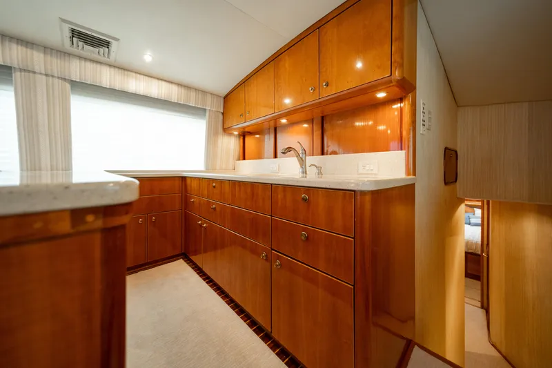 Slide: The Image of Luxurious wooden kitchen interior of 2004 Ocean Yachts 50 Super Sport. - 31