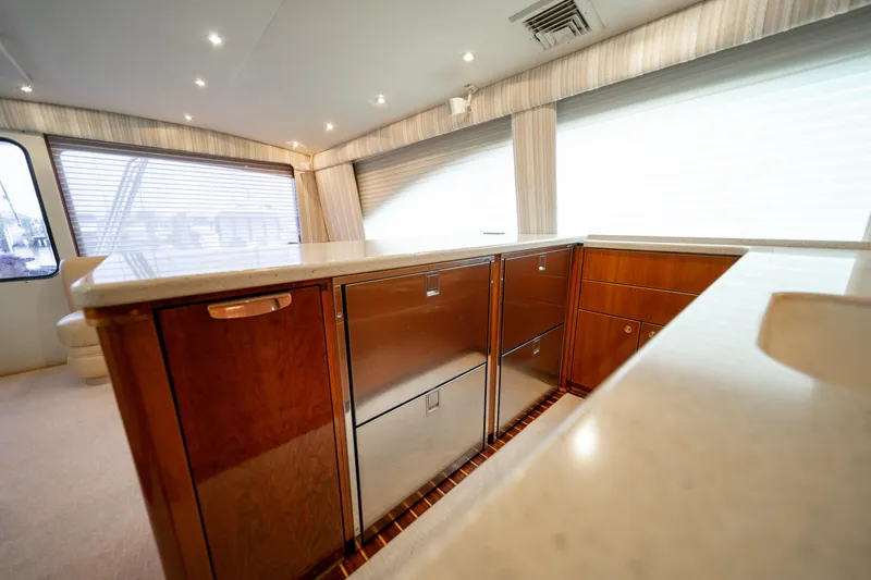 Slide: The Image of Luxurious interior of 2004 Ocean Yachts 50 Super Sport with elegant cabinetry and modern design. - 32