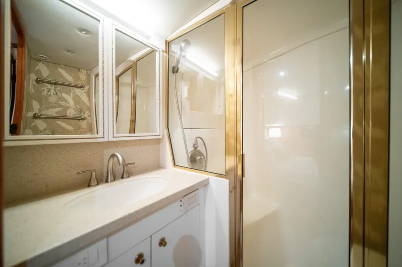 Slide: The Image of Luxurious bathroom in 2004 Ocean Yachts 50 Super Sport with shower and vanity. - 41