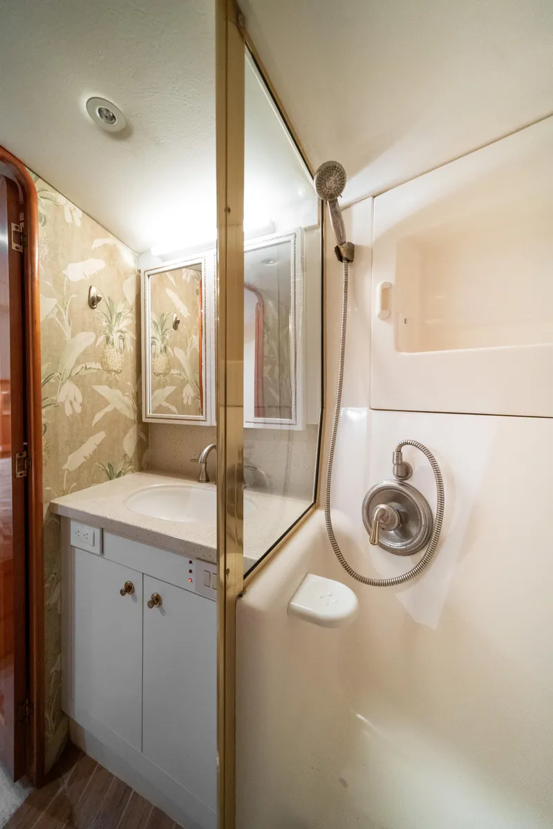 Slide: The Image of 2004 Ocean Yachts 50 Super Sport bathroom with shower and vanity. - 49