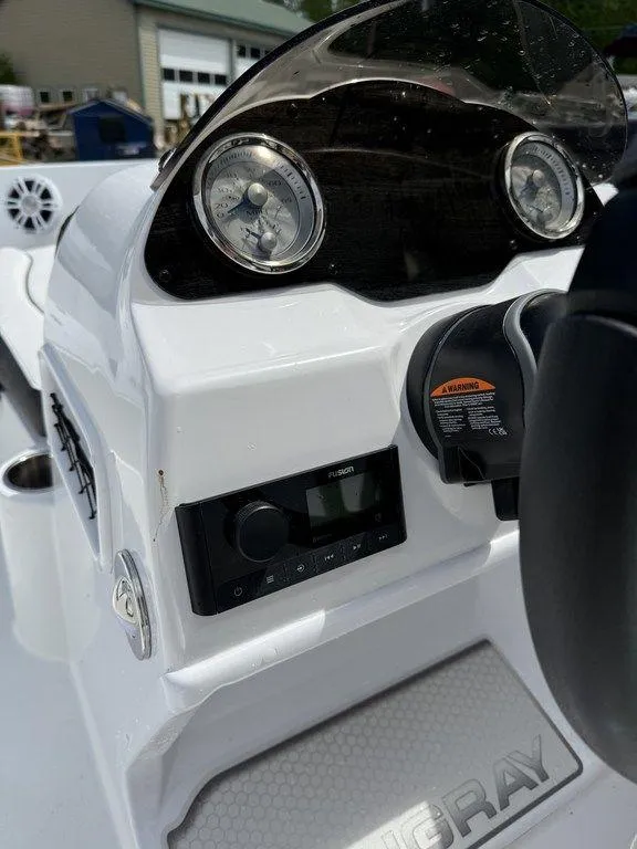 Slide: The Image of Dashboard of a 2025 Stingray 182SC boat with gauges and controls. - 17