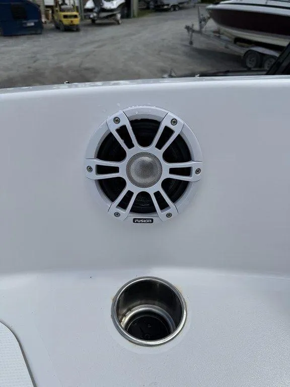 Slide: The Image of 2025 Stingray 182SC boat speaker and cup holder on deck. - 21