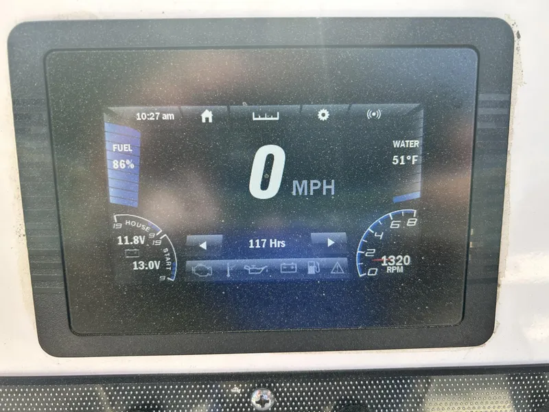 Slide: The Image of Dashboard display of a 2021 Yamaha Boats 195 FSH Sport showing speed, fuel, and water temperature. - 4