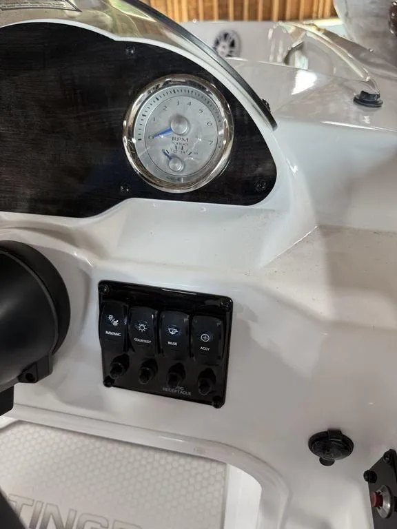 Slide: The Image of 2025 Stingray 182SC dashboard with gauge and control panel. - 18