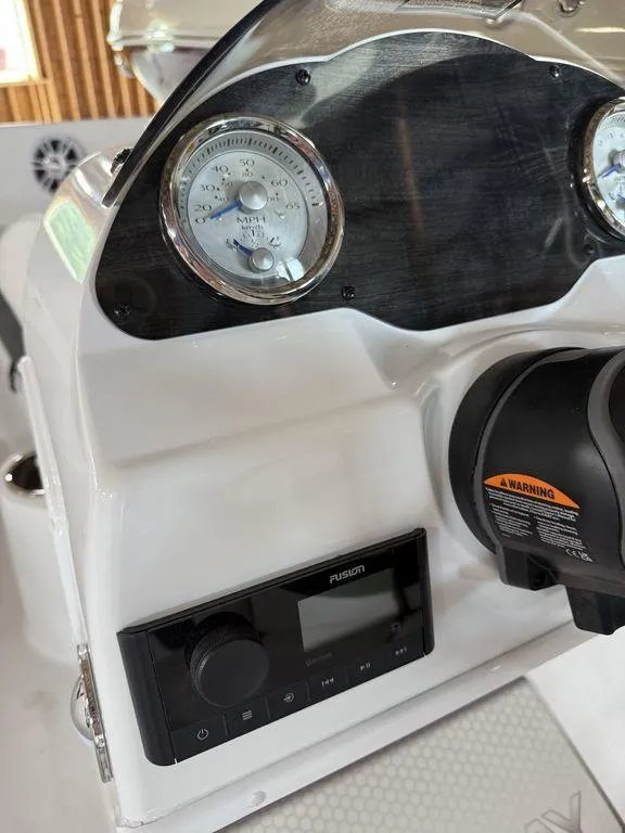 Slide: The Image of 2025 Stingray 182SC dashboard with gauges and controls, featuring a modern design. - 19