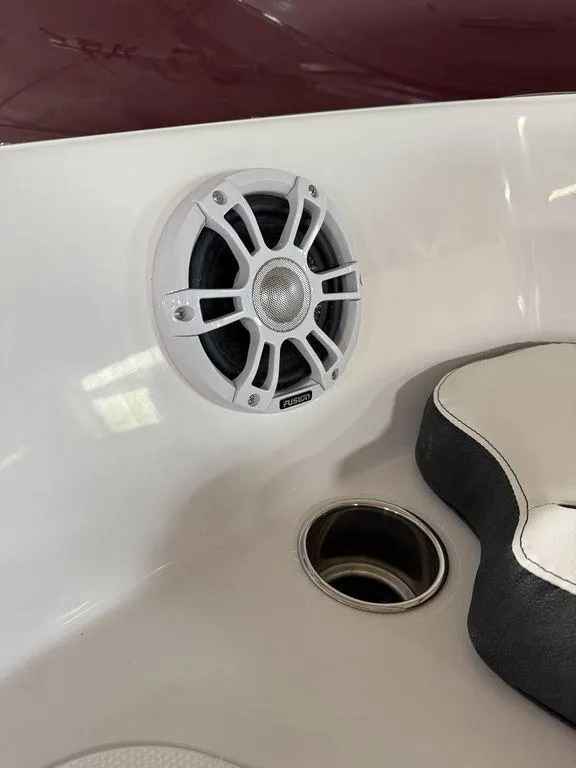 Slide: The Image of 2025 Stingray 182SC boat interior with speaker and cup holder. - 27