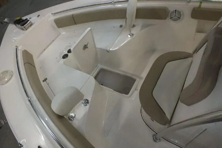 Slide: The Image of 2023 Key West 239 FS boat interior with seating and storage compartments. - 2