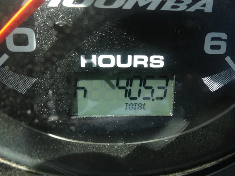 Slide: The Image of 2011 Moomba Outback V hour meter displaying 405.3 hours. - 9