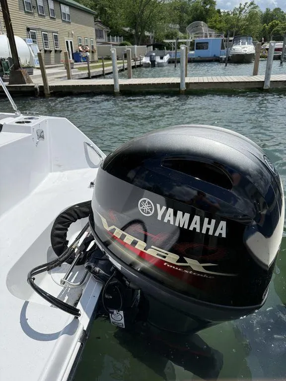 Slide: The Image of Yamaha VMAX outboard motor on 2025 Stingray 172SC boat at dockside. - 9