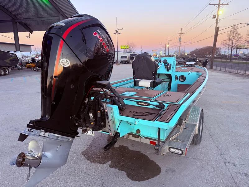 Slide: The Image of 2022 Custom Uncle J 19 Bay Center Console Aluminum boat with powerful outboard motor. - 3