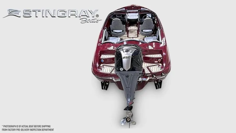 Slide: The Image of 2025 Stingray 23 OSX boat, maroon exterior, top view, featuring powerful outboard motor. - 39
