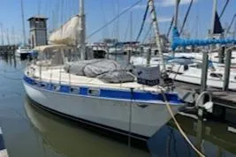 The Image of 1987 Morgan Catalina Morgan 41 Classic sailboat docked in a marina. - 0