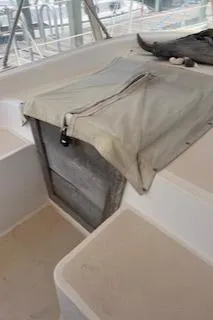 Slide: The Image of Interior of 1987 Morgan Catalina Morgan 41 Classic sailboat with wooden cabinetry and seating. - 16