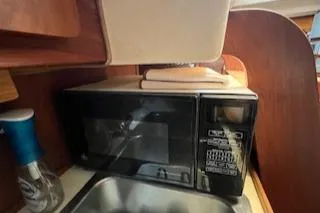 Slide: The Image of Stern view of a 1987 Morgan Catalina Morgan 41 Classic in harbor. - 41