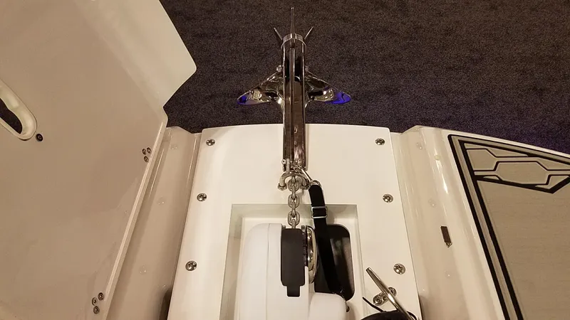 Slide: The Image of 2018 Four Winns HD270 OB boat anchor compartment with stainless steel fittings. - 10