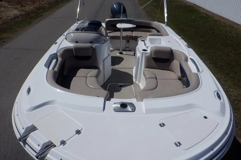 Slide: The Image of 2014 Hurricane SunDeck Sport 203 OB boat with spacious seating and sleek design. - 3
