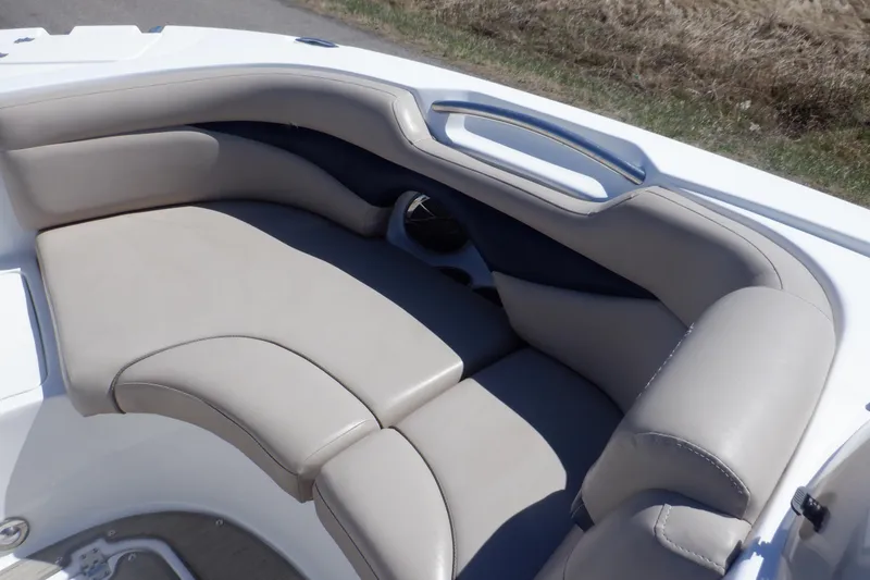 Slide: The Image of 2014 Hurricane SunDeck Sport 203 OB boat interior with beige cushioned seating. - 44