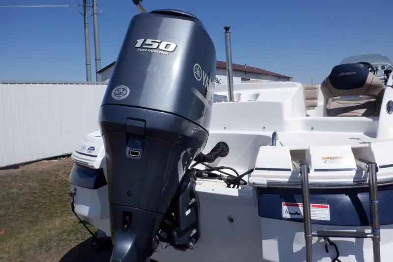 Slide: The Image of 2014 Hurricane SunDeck Sport 203 OB boat with Yamaha 150 outboard motor. - 6