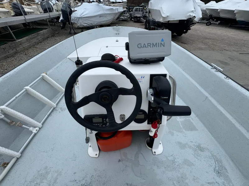Slide: The Image of Steering console of a 2003 Maritime 1690 boat with Garmin navigation system. - 5
