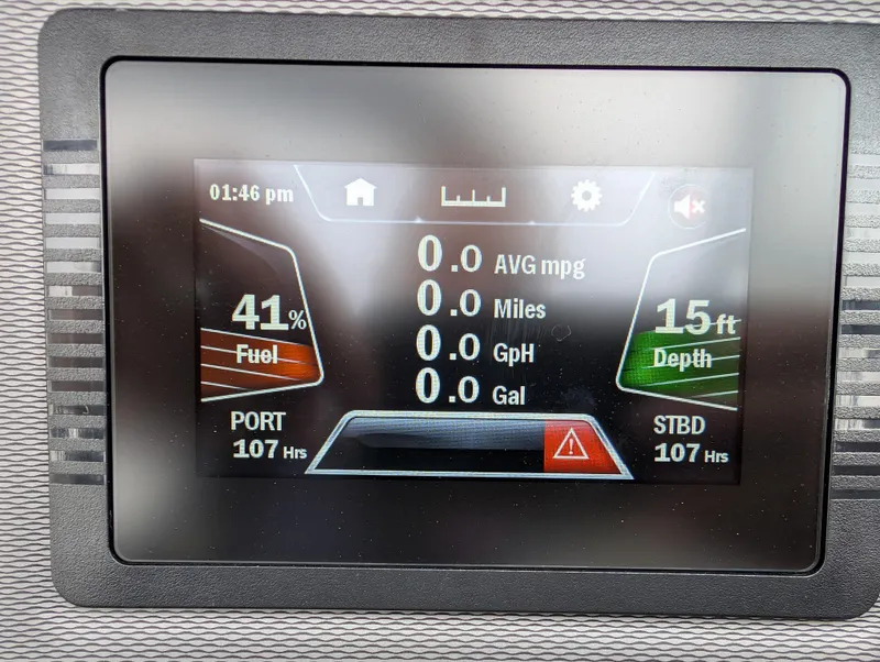 Slide: The Image of Dashboard display of a 2017 Yamaha Boats AR210 showing fuel, depth, and engine hours. - 21