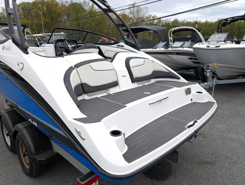 Slide: The Image of 2017 Yamaha AR210 boat with sleek design and comfortable seating on display. - 3