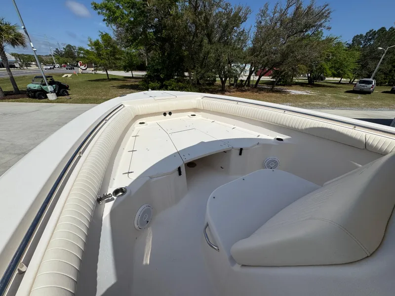 Slide: The Image of 2014 Grady-White Canyon 336 boat interior with spacious seating and storage. - 30