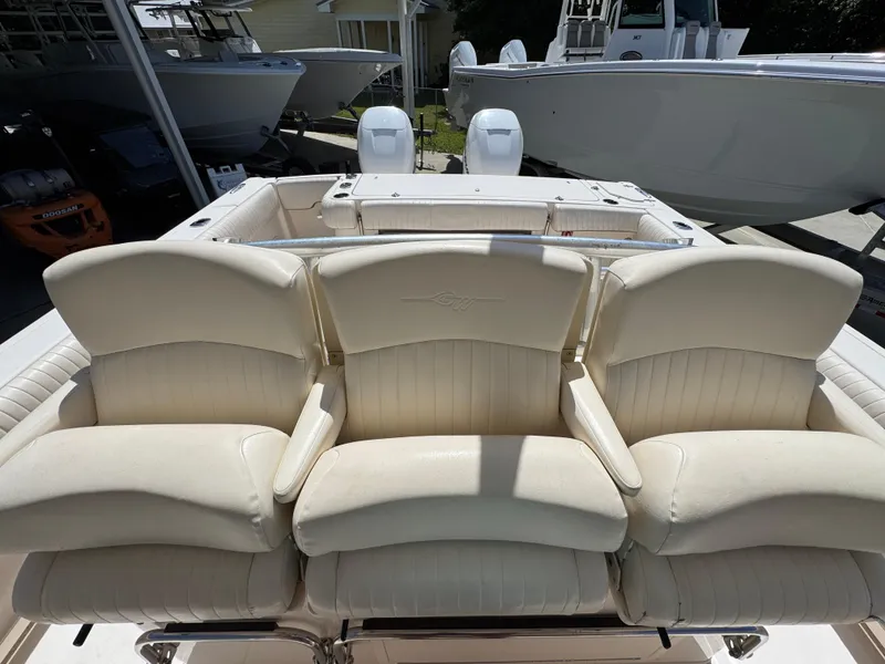 Slide: The Image of 2014 Grady-White Canyon 336 boat with comfortable seating and dual engines. - 37