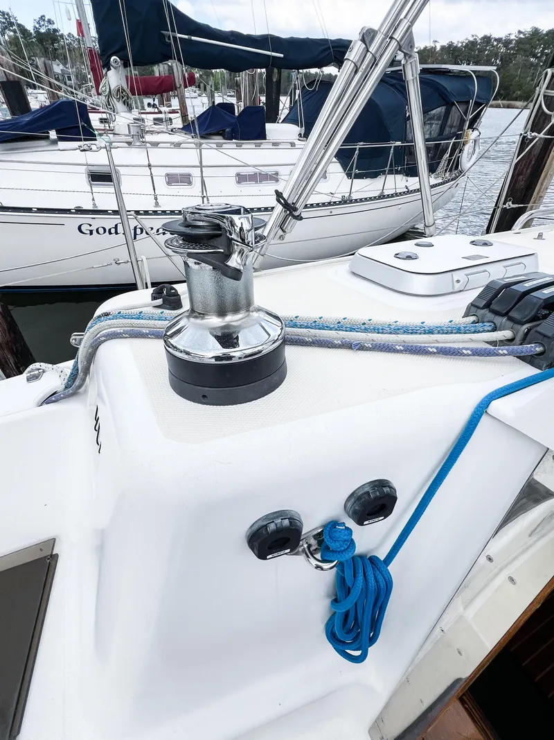 Slide: The Image of Sailing yacht deck with winch, ropes, and cleats, Saga 43, 1998 model. - 10
