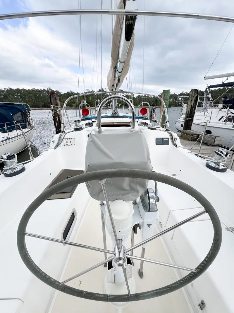 Slide: The Image of Sailboat cockpit view, Saga 43, 1998 model, docked at marina. - 13