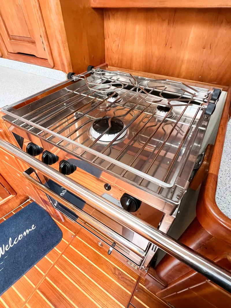 Slide: The Image of Stainless steel stove in 1998 Saga 43 yacht kitchen with wooden cabinetry. - 30