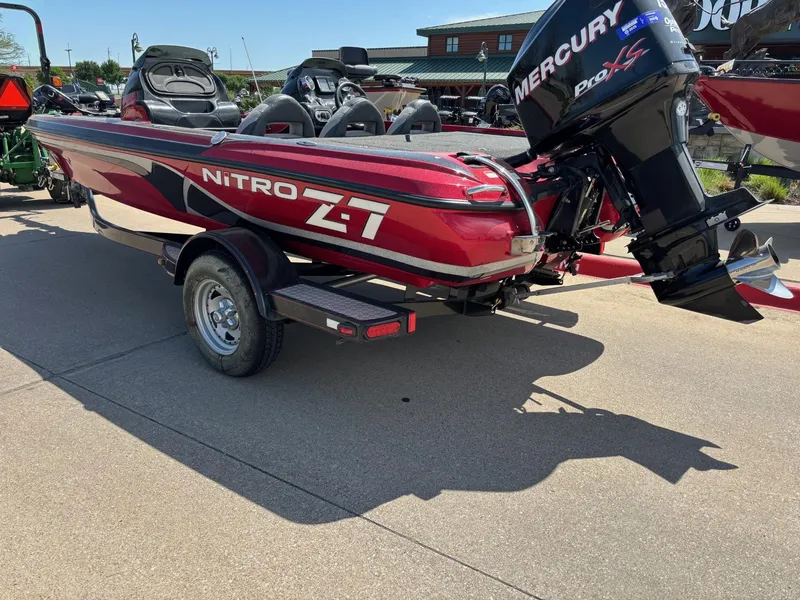 Slide: The Image of 2012 Nitro Z7 boat with Mercury Pro XS engine on a trailer. - 3