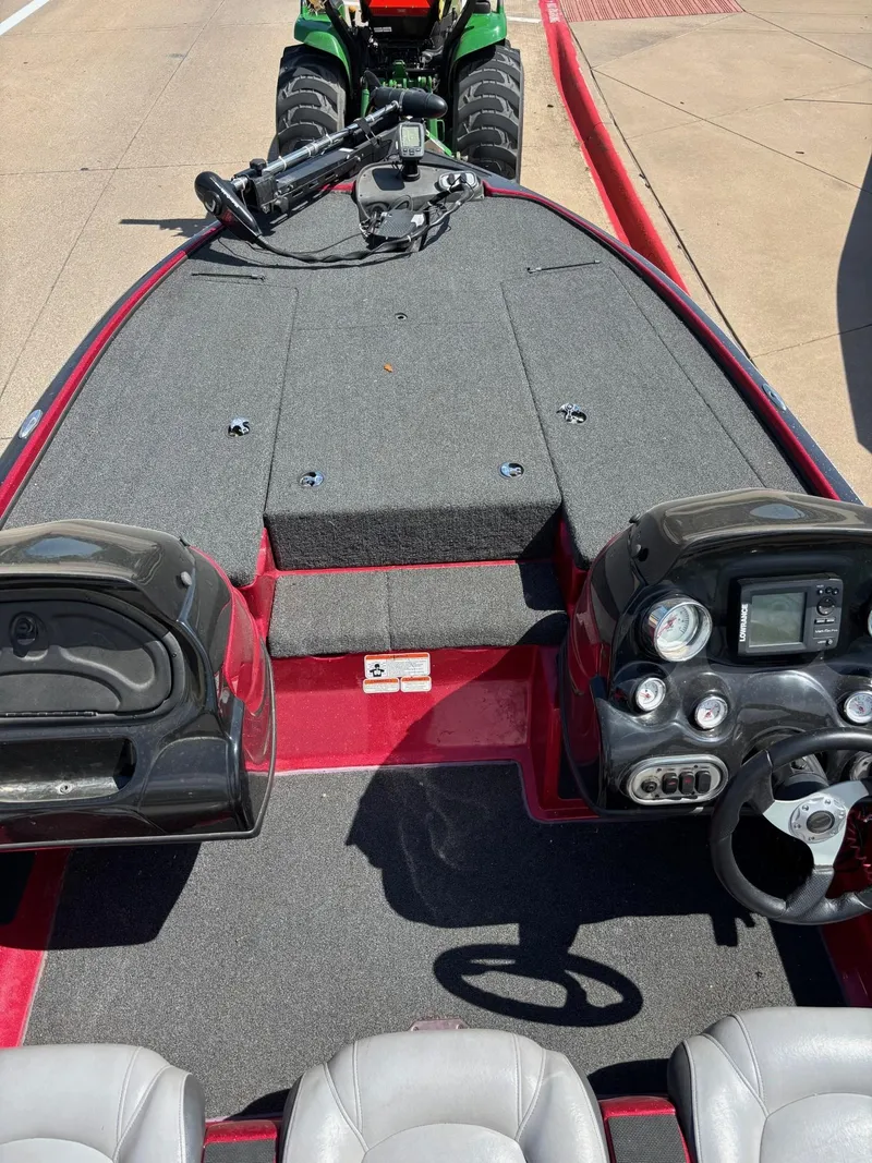 Slide: The Image of 2012 Nitro Z7 boat interior with steering console and seating. - 5